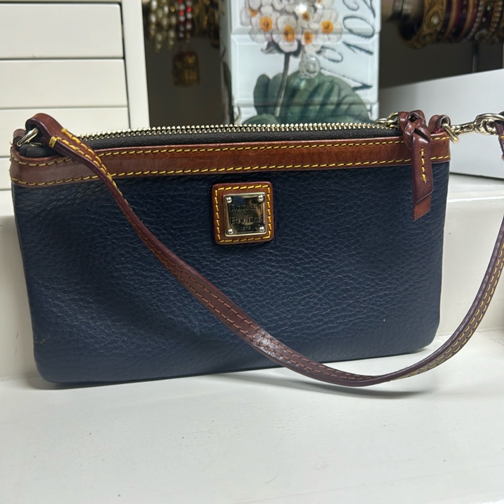 Dooney and Brouke small bag. Blue and brown leather.